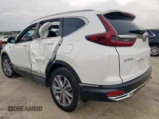 2020 Honda CR-V Touring with VIN 7FART6H97LE022298, listed as a Copart auction lot 63292795 with 57,141 mi miles and Salvage title. Bid and sale history available at DreamBid. Image 2.