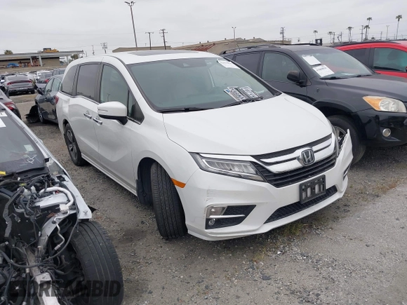 2020 Honda Odyssey Touring with VIN 5FNRL6H81LB028083, listed as a IAAI auction lot 42003810 with 71,536 mi miles and . Bid and sale history available at DreamBid. Image 1.