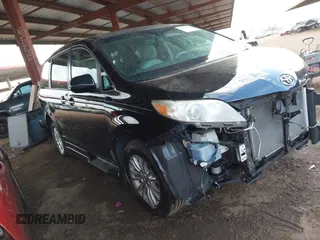 2012 Toyota Sienna XLE AAS with VIN 5TDYK3DC6CS263128, listed as a IAAI auction lot 41583798 with 114,820 mi miles. Bid and sale history available at carsss.com. Image 1.
