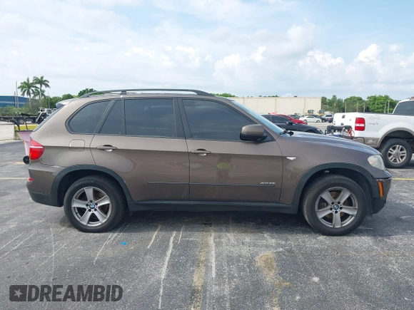 2012 BMW X5 35i z VIN 5UXZV4C53CL991140, wystawiony jako IAAI lot #42312591 z przebiegiem 115 875 mil mil oraz . Historia ofert i sprzedaży dostępna na DreamBid. Obrazek 13.