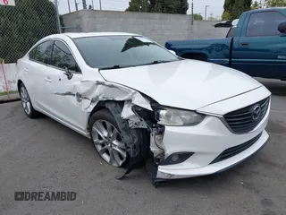 2016 Mazda Mazda6 i Touring with VIN JM1GJ1V52G1468807, listed as a IAAI auction lot 41888686 with 121,764 mi miles. Bid and sale history available at carsss.com. Image 1.