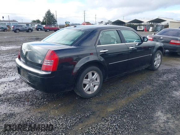 2006 Chrysler 300 C with VIN 2C3LK63H66H437280, listed as a IAAI auction lot 41615050 with 209,303 mi miles. Bid and sale history available at carsss.com. Image 4.