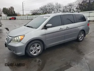 2009 Honda Odyssey Touring with VIN 5FNRL38949B002013, listed as a Copart auction lot 79505334 with 236,269 mi miles and Salvage title. Bid and sale history available at DreamBid. Image 1.