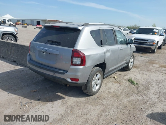 2016 Jeep Compass Latitude with VIN 1C4NJCEA7GD675742, listed as a IAAI auction lot 41877787 with 107,749 mi miles and . Bid and sale history available at DreamBid. Image 4.
