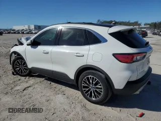 2022 Ford Escape Titanium Plug-In Hybrid with VIN 1FMCU0LZ2NUB80380, listed as a Copart auction lot 80961924 with 7,858 mi miles and Salvage title. Bid and sale history available at DreamBid. Image 2.