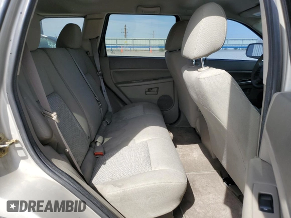 2007 Jeep Grand Cherokee Laredo z VIN 1J8GR48K17C596514, wystawiony jako Copart lot #54404755 z przebiegiem 230 033 mil mil oraz Szkoda całkowita • Salvage title. Historia ofert i sprzedaży dostępna na DreamBid. Obrazek 11.
