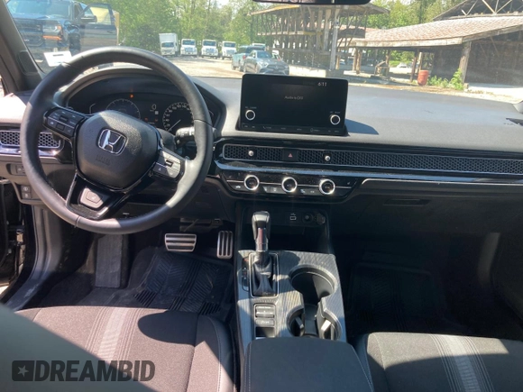 2023 Honda Civic Sport z VIN 2HGFE2F50PH108541, wystawiony jako Copart lot #53641295 z przebiegiem 27 991 mil mil oraz Szkoda całkowita • Salvage title. Historia ofert i sprzedaży dostępna na DreamBid. Obrazek 7.