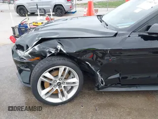 2021 Ford Mustang GT z VIN 1FA6P8CF2M5149643, wystawiony jako IAAI lot #41981794 z przebiegiem 57 345 mil mil oraz . Historia ofert i sprzedaży dostępna na DreamBid. Obrazek 6.