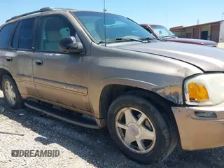 2003 GMC Envoy SLT with VIN 1GKDS13S432246741, listed as a IAAI auction lot 42051902 with 344,691 mi miles and . Bid and sale history available at DreamBid. Image 6.