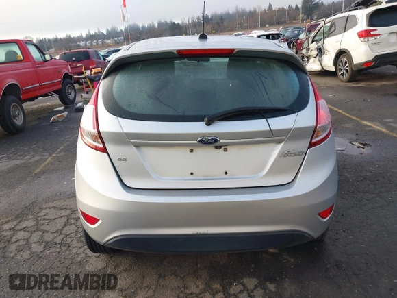 2019 Ford Fiesta SE z VIN 3FADP4EJ7KM147864, wystawiony jako IAAI lot #41692160 z przebiegiem 87 417 mil mil oraz . Historia ofert i sprzedaży dostępna na DreamBid. Obrazek 16.