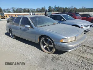 1994 Chevrolet Caprice z VIN 1G1BL52W4RR114969, wystawiony jako Copart lot #76950754 z przebiegiem Nie podano mil oraz Szkoda całkowita • Salvage title. Historia ofert i sprzedaży dostępna na DreamBid. Obrazek 4.