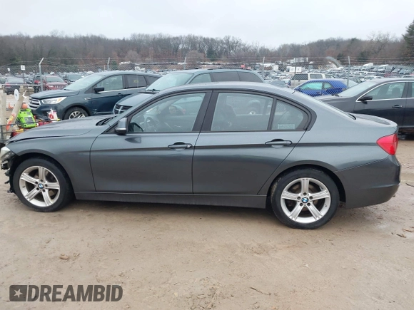 2014 BMW 3 Series 328d xDrive with VIN WBA3D5C53EKX96709, listed as a IAAI auction lot 41651730 with 160,797 mi miles. Bid and sale history available at carsss.com. Image 14.