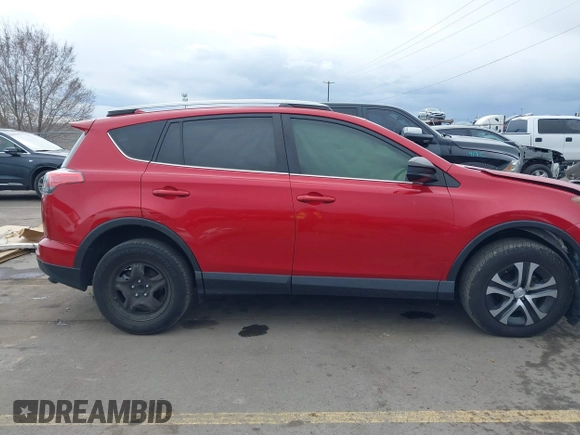 2017 Toyota RAV4 LE with VIN JTMZFREV1HJ125822, listed as a IAAI auction lot 41763849 with 91,429 mi miles and . Bid and sale history available at carsss.com. Image 14.