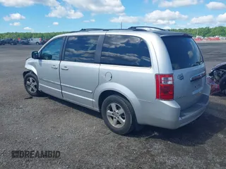 2009 Dodge Grand Caravan SXT z VIN 2D8HN541X9R663021, wystawiony jako IAAI lot #42202983 z przebiegiem 255 173 mil mil oraz . Historia ofert i sprzedaży dostępna na DreamBid. Obrazek 3.