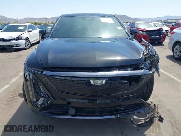 2024 Cadillac LYRIQ Sport z VIN 1GYKPVRK6RZ131099, wystawiony jako IAAI lot #41979330 z przebiegiem 3953 mil mil oraz . Historia ofert i sprzedaży dostępna na DreamBid. Obrazek 12.