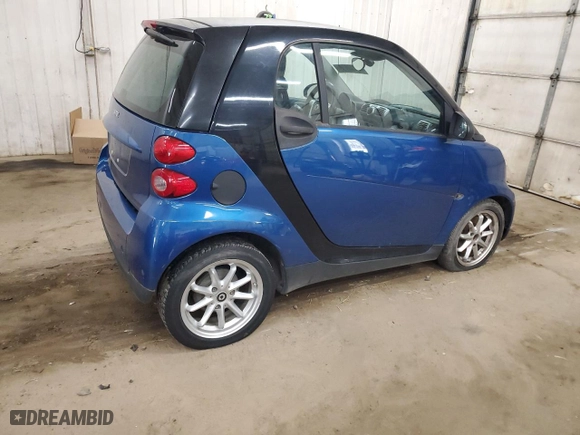 2009 Smart fortwo Pure with VIN WMEEJ31X99K209790, listed as a Copart auction lot 51102685 with 30,389 mi miles and Salvage Title. Bid and sale history available at carsss.com. Image 3.