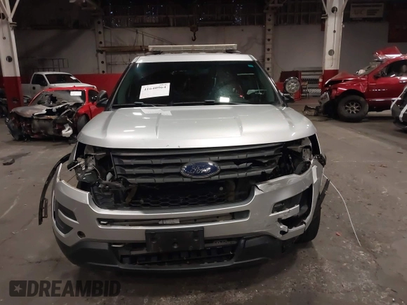 2016 Ford Police Interceptor Utility z VIN 1FM5K8AR2GGC06039, wystawiony jako IAAI lot #41640964 z przebiegiem 85 915 mil mil oraz . Historia ofert i sprzedaży dostępna na DreamBid. Obrazek 12.