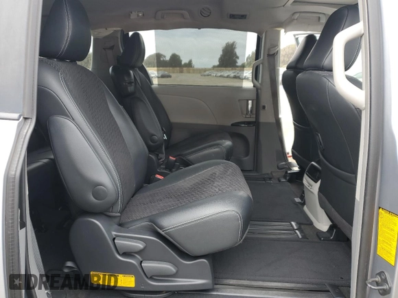 2013 Toyota Sienna SE with VIN 5TDXK3DC6DS386716, listed as a Copart auction lot 63122435 with 77,371 mi miles and Salvage title. Bid and sale history available at DreamBid. Image 11.