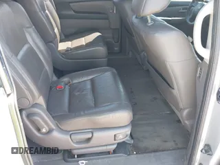 2012 Honda Odyssey Touring with VIN 5FNRL5H90CB099519, listed as a IAAI auction lot 41854550 with 185,110 mi miles. Bid and sale history available at carsss.com. Image 8.