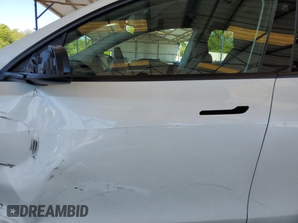 2024 Tesla Model Y с VIN 7SAYGDED5RF086456, выставлен на аукционе Copart как лот 57994835 с пробегом Не указан миль и Списание • Salvage title. История ставок и продаж доступна на DreamBid. Изображение 7.