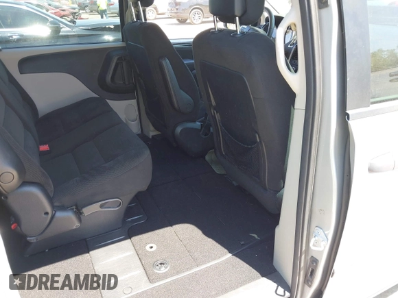 2016 Dodge Grand Caravan SE with VIN 2C4RDGBG9GR385847, listed as a IAAI auction lot 42042755 with 32,613 mi miles and . Bid and sale history available at DreamBid. Image 8.