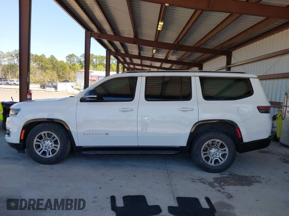 2023 Jeep Grand Wagoneer with VIN 1C4SJUAT5PS509425, listed as a IAAI auction lot 41765704 with 65,656 mi miles and . Bid and sale history available at DreamBid. Image 14.