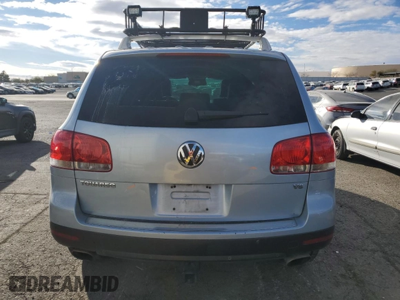 2004 Volkswagen Touareg with VIN WVGEM77LX4D071560, listed as a Copart auction lot 41630995 with 168,906 mi miles and Salvage title. Bid and sale history available at DreamBid. Image 6.