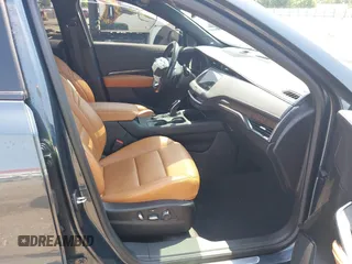 2021 Cadillac XT4 FWD Sport with VIN 1GYFZER41MF079193, listed as a IAAI auction lot 42331594 with 72,287 mi miles and . Bid and sale history available at DreamBid. Image 5.