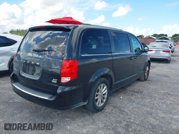 2019 Dodge Grand Caravan SXT with VIN 2C4RDGCG5KR797853, listed as a IAAI auction lot 40332854 with 81,197 mi miles and . Bid and sale history available at DreamBid. Image 4.