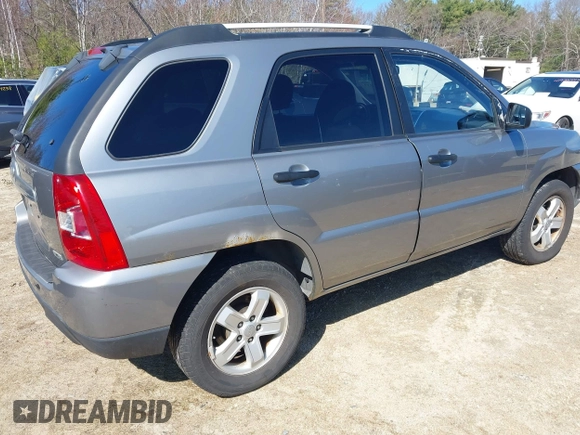 2010 Kia Sportage LX with VIN KNDKGCA38A7733453, listed as a IAAI auction lot 41932937 with 148,056 mi miles and . Bid and sale history available at carsss.com. Image 4.