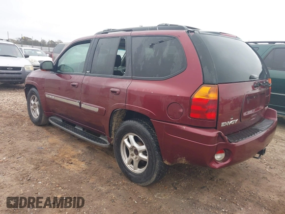 2003 GMC Envoy SLT z VIN 1GKDS13S532314397, wystawiony jako IAAI lot #41184274 z przebiegiem 232 750 mil mil oraz . Historia ofert i sprzedaży dostępna na DreamBid. Obrazek 3.