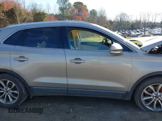 2015 Lincoln MKC z VIN 5LMCJ1A93FUJ26649, wystawiony jako IAAI lot #41832976 z przebiegiem 215 692 mil mil oraz . Historia ofert i sprzedaży dostępna na DreamBid. Obrazek 12.