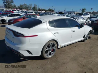 2020 Kia Stinger GT with VIN KNAE35LC7L6085529, listed as a IAAI auction lot 40671705 with 62,970 mi miles. Bid and sale history available at carsss.com. Image 4.
