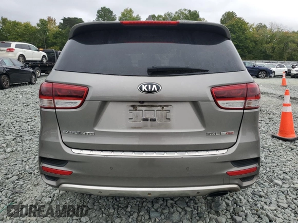 2016 Kia Sorento SXL with VIN 5XYPK4A14GG059158, listed as a Copart auction lot 72459954 with 264,218 mi miles and Salvage Title. Bid and sale history available at carsss.com. Image 6.
