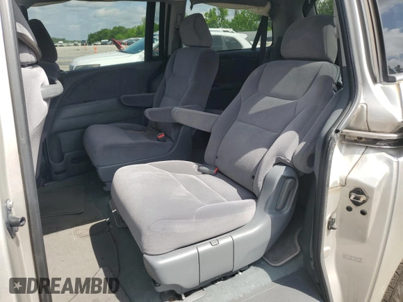 2007 Honda Odyssey LX z VIN 5FNRL382X7B084104, wystawiony jako Copart lot #57399625 z przebiegiem 213 134 mil mil oraz Szkoda całkowita • Salvage title. Historia ofert i sprzedaży dostępna na DreamBid. Obrazek 11.