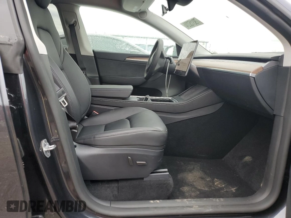 2024 Tesla Model Y Long Range z VIN 7SAYGDEE3RF087162, wystawiony jako Copart lot #79315224 z przebiegiem 3 232 mil mil oraz Szkoda całkowita • Salvage title. Historia ofert i sprzedaży dostępna na DreamBid. Obrazek 7.