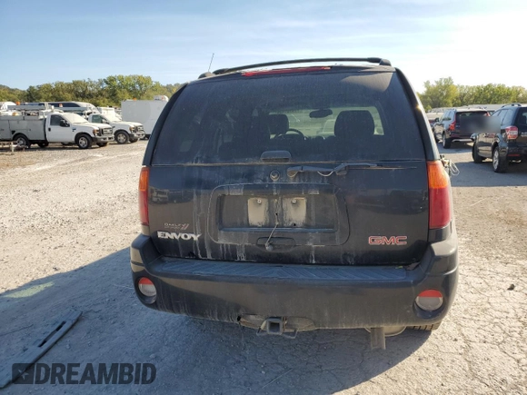 2002 GMC Envoy SLE with VIN 1GKDS13S022512481, listed as a Copart auction lot 74701454 with 0 mi miles and Salvage Title. Bid and sale history available at carsss.com. Image 6.