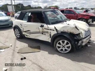 2008 MINI Convertible with VIN WMWRF33518TF67472, listed as a Copart auction lot 72073604 with 61,024 mi miles and Salvage title. Bid and sale history available at DreamBid. Image 4.