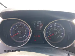 2013 Hyundai Elantra GLS z VIN KMHDH4AE0DU564978, wystawiony jako IAAI lot #39801664 z przebiegiem 40 046 mil mil oraz . Historia ofert i sprzedaży dostępna na DreamBid. Obrazek 7.