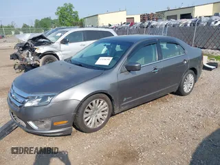 2011 Ford Fusion Hybrid with VIN 3FADP0L34BR253253, listed as a IAAI auction lot 42458290 with 137,110 mi miles and . Bid and sale history available at DreamBid. Image 2.