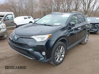 2017 Toyota RAV4 Hybrid Limited with VIN JTMDJREV7HD136797, listed as a IAAI auction lot 41733609 with 131,162 mi miles. Bid and sale history available at carsss.com. Image 2.