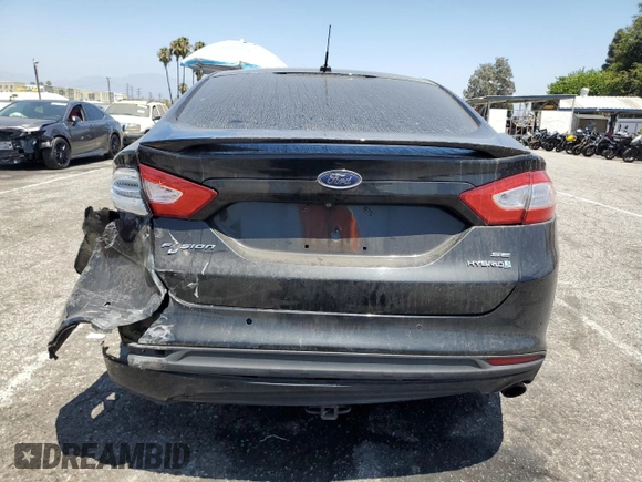 2014 Ford Fusion SE Hybrid with VIN 3FA6P0LU2ER185685, listed as a Copart auction lot 62941405 with 173,939 mi miles and Clean title. Bid and sale history available at DreamBid. Image 6.