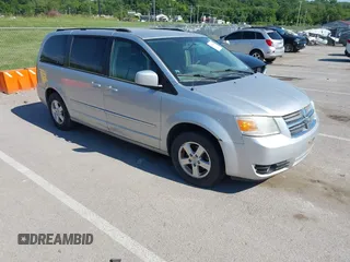 2010 Dodge Grand Caravan SXT z VIN 2D4RN5D16AR190907, wystawiony jako IAAI lot #42321433 z przebiegiem 209 881 mil mil oraz . Historia ofert i sprzedaży dostępna na DreamBid. Obrazek 1.