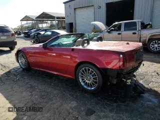 2005 Cadillac XLR z VIN 1G6YV34A555600826, wystawiony jako Copart lot #79404394 z przebiegiem 94 892 mil mil oraz Szkody całkowita. Historia ofert i sprzedaży dostępna na DreamBid. Obrazek 2.