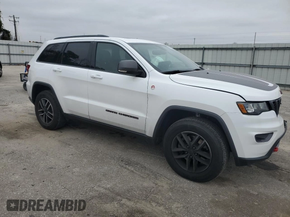 2021 Jeep Grand Cherokee Trailhawk with VIN 1C4RJFLG5MC756167, listed as a Copart auction lot 86233314 with 75,839 mi miles and Salvage Title. Bid and sale history available at carsss.com. Image 4.