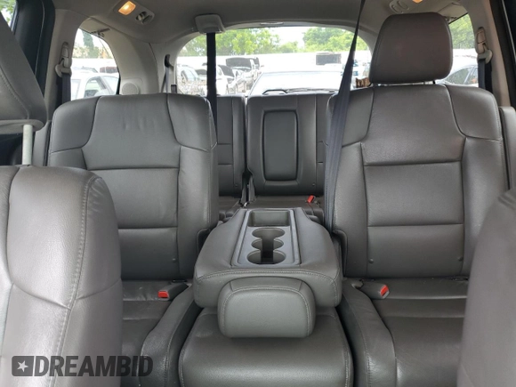 2015 Honda Odyssey Touring Elite с VIN 5FNRL5H98FB071942, выставлен на аукционе Copart как лот 57132464 с пробегом 148 015 миль миль и Списание • Salvage title. История ставок и продаж доступна на DreamBid. Изображение 10.
