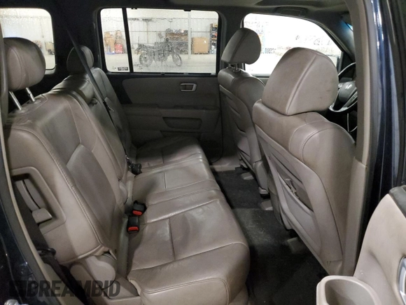 2009 Honda Pilot Touring z VIN 5FNYF48899B054320, wystawiony jako Copart lot #58948585 z przebiegiem 254 997 mil mil oraz Szkoda całkowita • Salvage title. Historia ofert i sprzedaży dostępna na DreamBid. Obrazek 11.