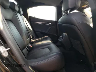 2018 Maserati Ghibli S Q4 z VIN ZAM57YTA5J1279909, wystawiony jako Copart lot #54559285 z przebiegiem 49 065 mil mil oraz Szkoda całkowita • Salvage title. Historia ofert i sprzedaży dostępna na DreamBid. Obrazek 10.