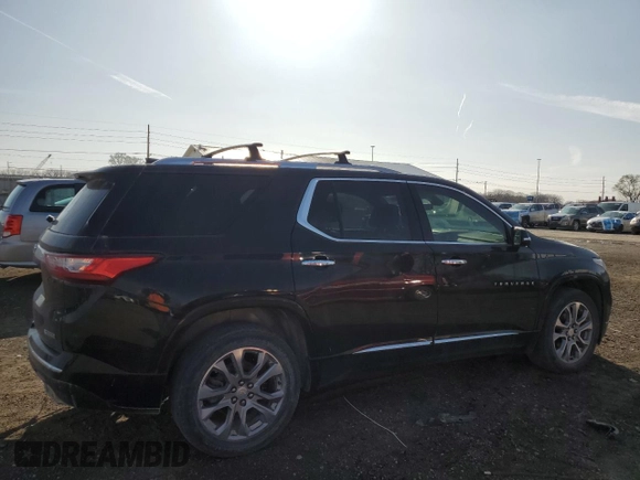 2018 Chevrolet Traverse Premier with VIN 1GNEVJKW5JJ152423, listed as a Copart auction lot 51202685 with 124,673 mi miles and Salvage Title. Bid and sale history available at DreamBid. Image 3.