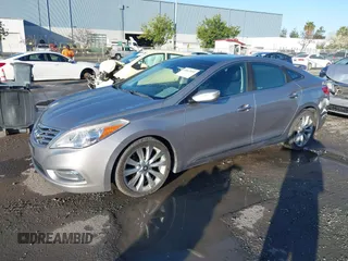 2013 Hyundai Azera z VIN KMHFH4JG3DA230844, wystawiony jako IAAI lot #41817997 z przebiegiem 129 163 mil mil oraz . Historia ofert i sprzedaży dostępna na DreamBid. Obrazek 18.
